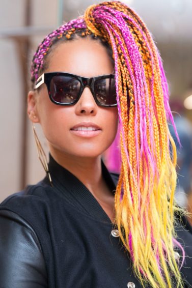 alicia keys in 2017 with long neon pink and yellow box braids