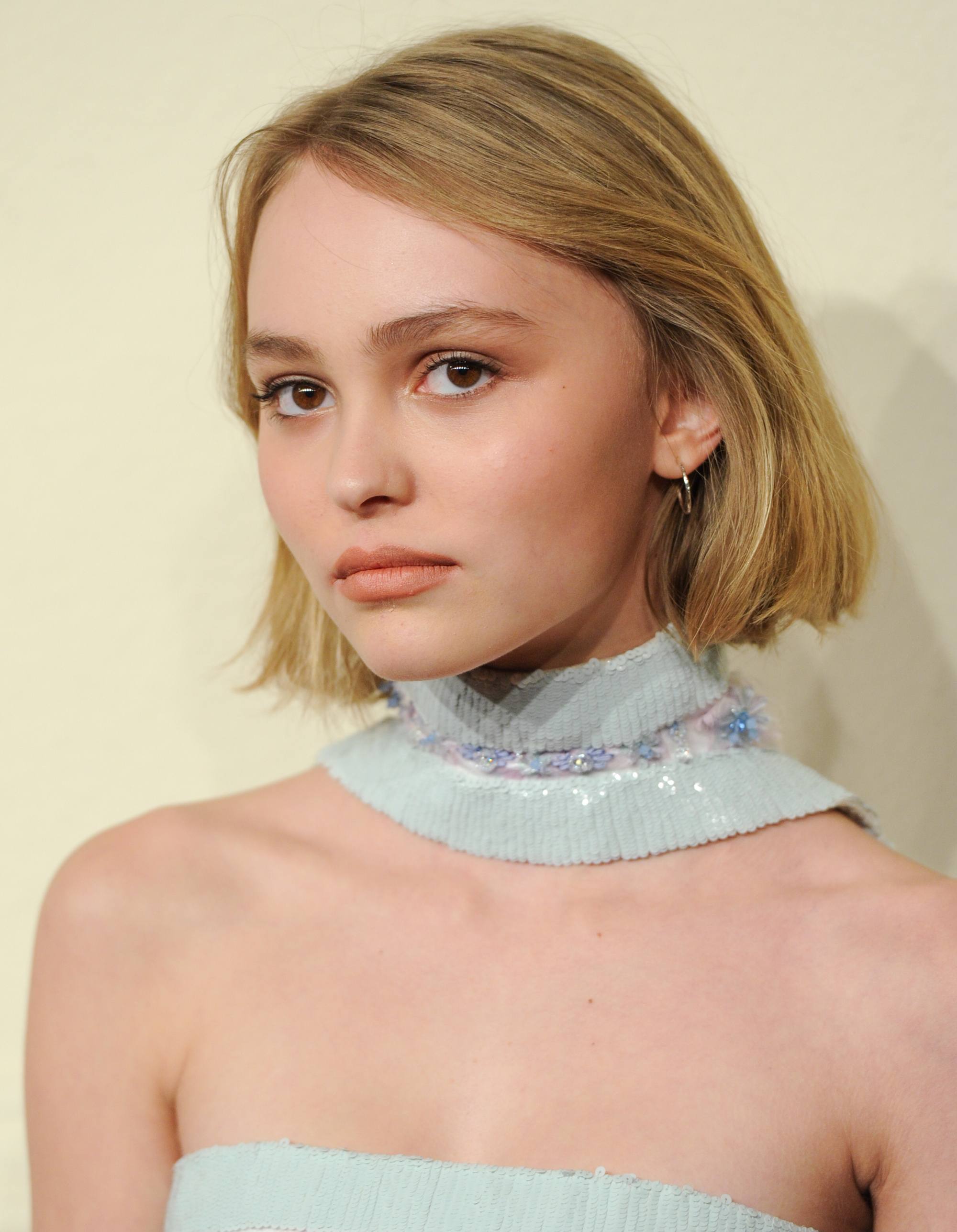 lily rose depp with blonde hair in blunt cut bob