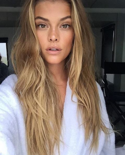front view of blonde model with long hair and highlights