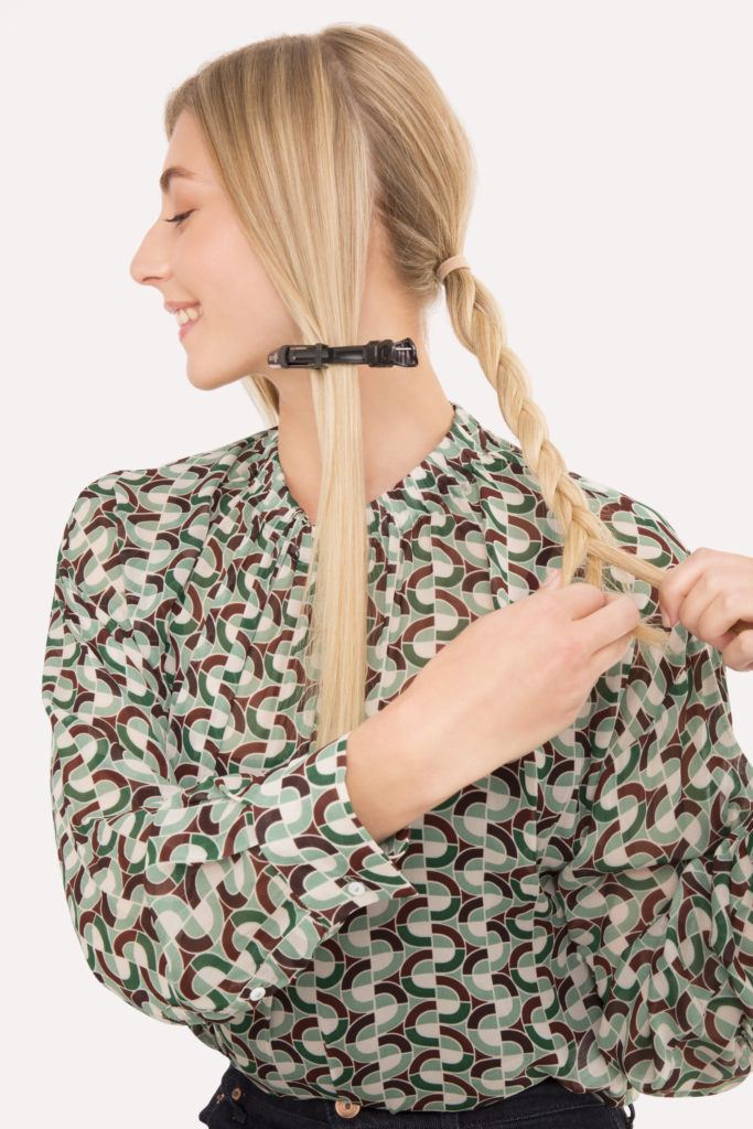 Braided updo tutorial blonde girl side profile braiding her hair