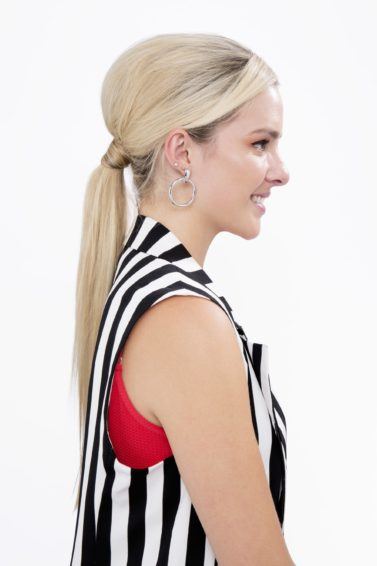 Blonde girl with hair bump side profile