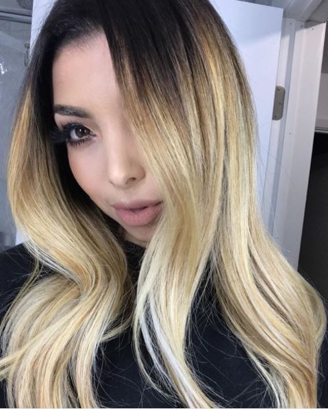 woman with heavy blonde ombre on long hair