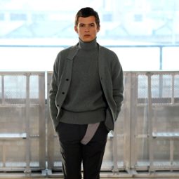 London Fashion Week Men's: Model on Xander Zhou runway with brown suave hairstyle.