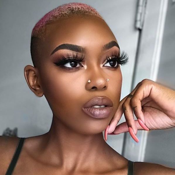 woman with pastel pink buzzcut