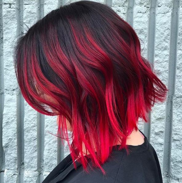 side view of black hair with red ombre colour