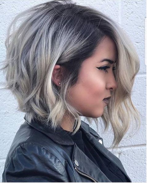 side view of blonde bob with dark roots