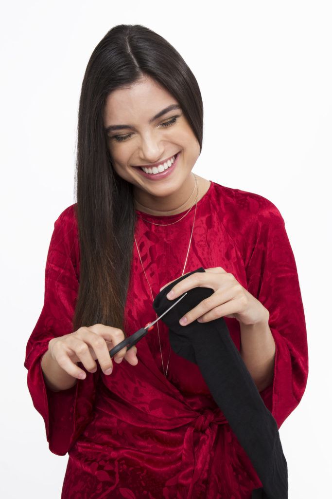Sock curls tutorial brunette girl cutting end off sock