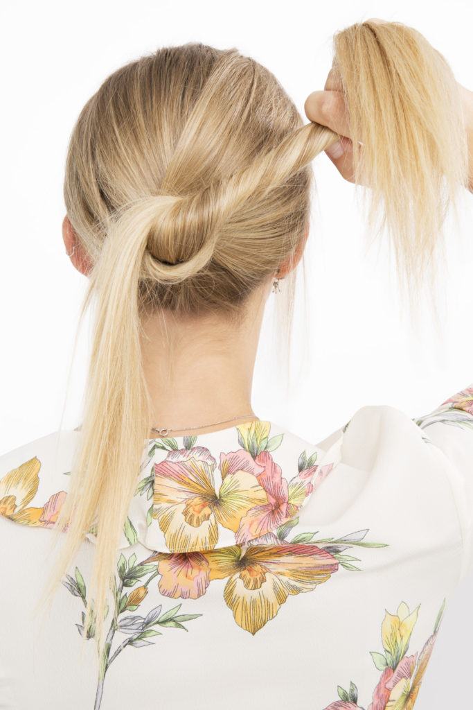 Banana bun tutorial blonde girl with twisted hair