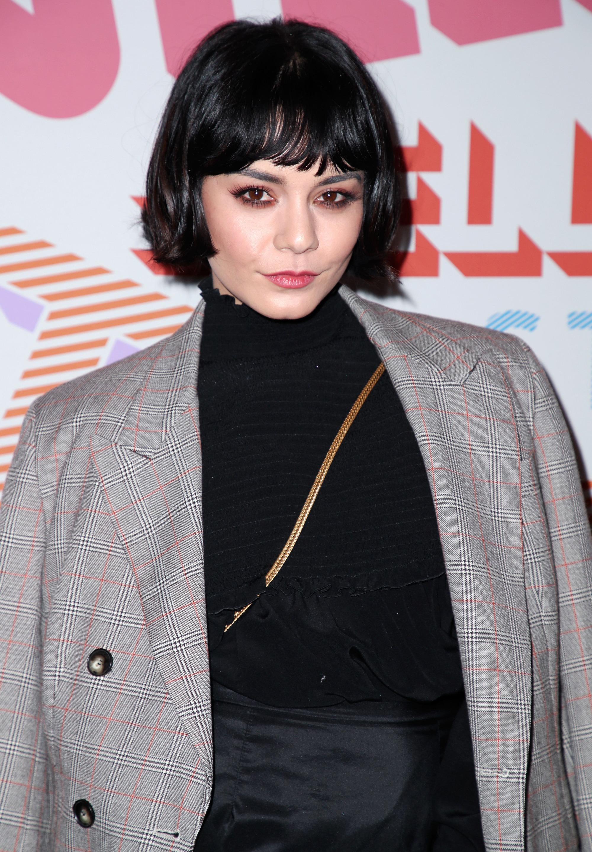 disney actress vanessa hudgens with a short black bob