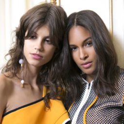 Wavy hair tips and tricks two brunette girls backstage at fashion show