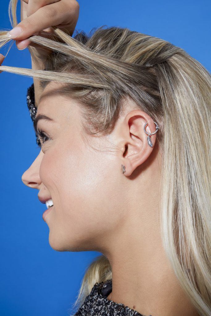 Blonde woman creating crown braid short hair