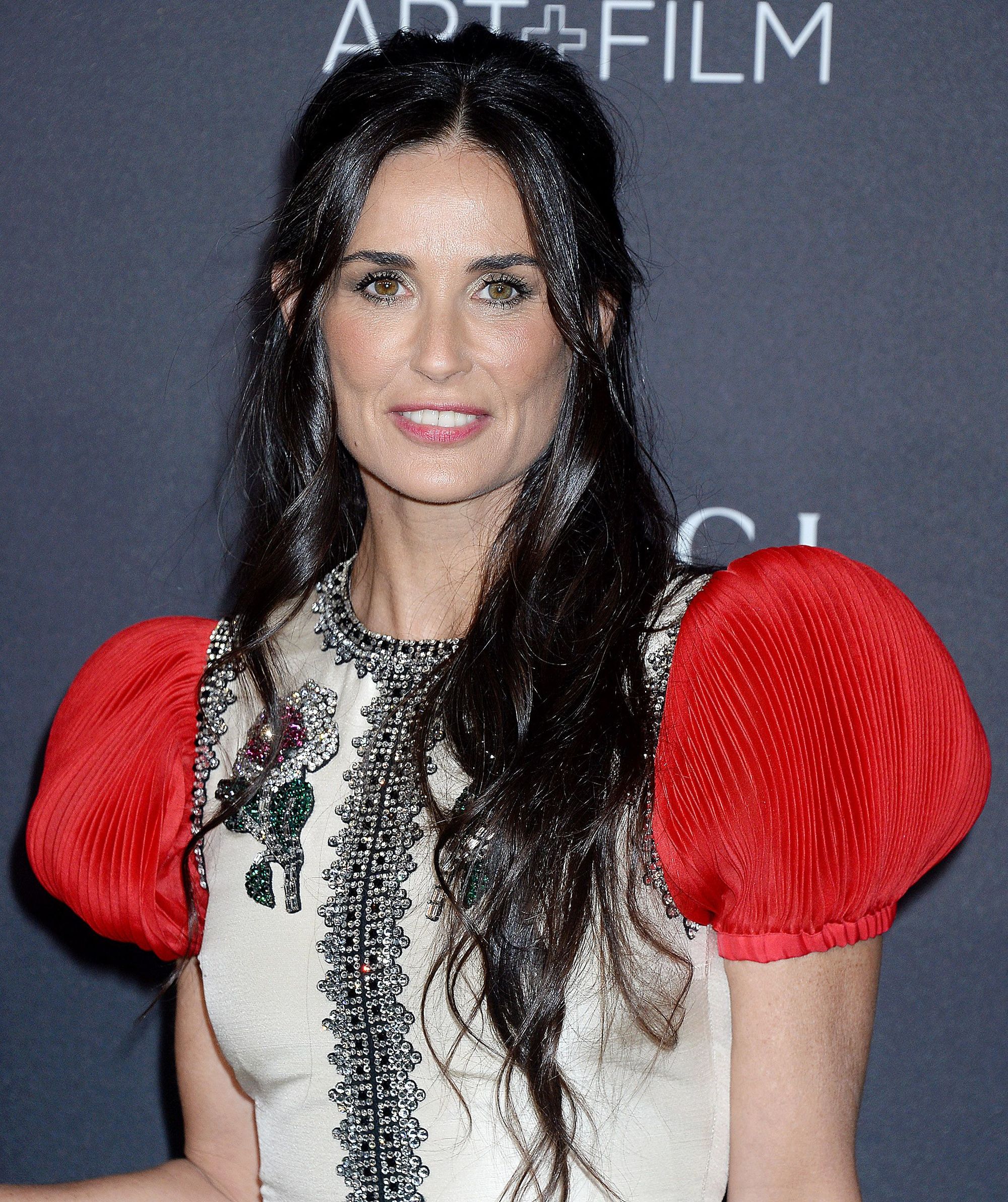 demi moore long dark brown wavy hair in half-up, half-down finish