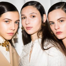Why is my hair so oily three models backstage at Ellery show