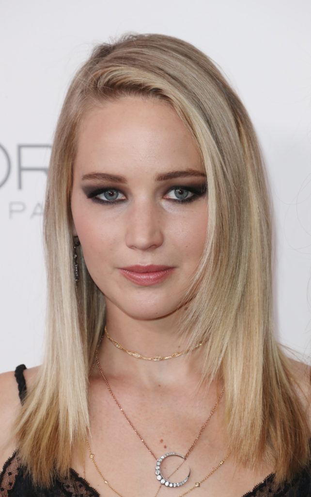 actress jennifer lawrence with straight blonde shoulder length hair with face framing layers