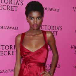 best deep conditioner for 4c hair: close up shot of amilna estevao with short afro hairstyle, backstage at Victoria's secret fashion show