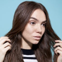 Woman with brunette hair and split ends