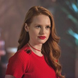 riverdale actress Madelaine Petsch who plays character Cheryl Blossom with long, sideswept red curly hair