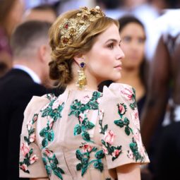 zoey deutch with light brown hair in a braided hairstyle wearing a tiara at the MET gala