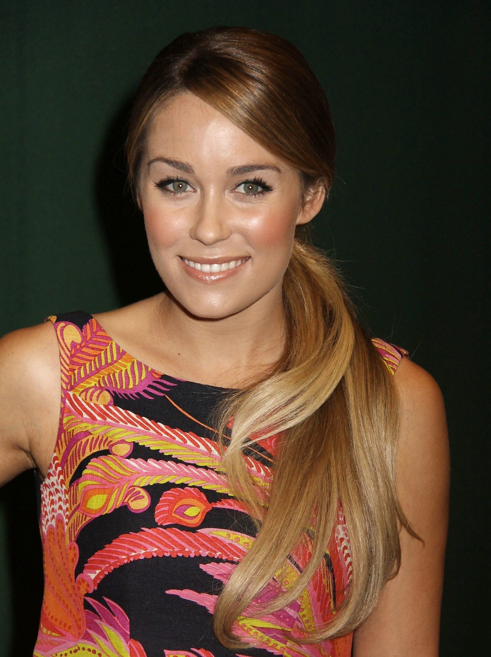 lauren conrad long blonde straight hair styled in a side ponytail