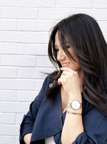 asian woman with shoulder length dark hair with long wispy layers