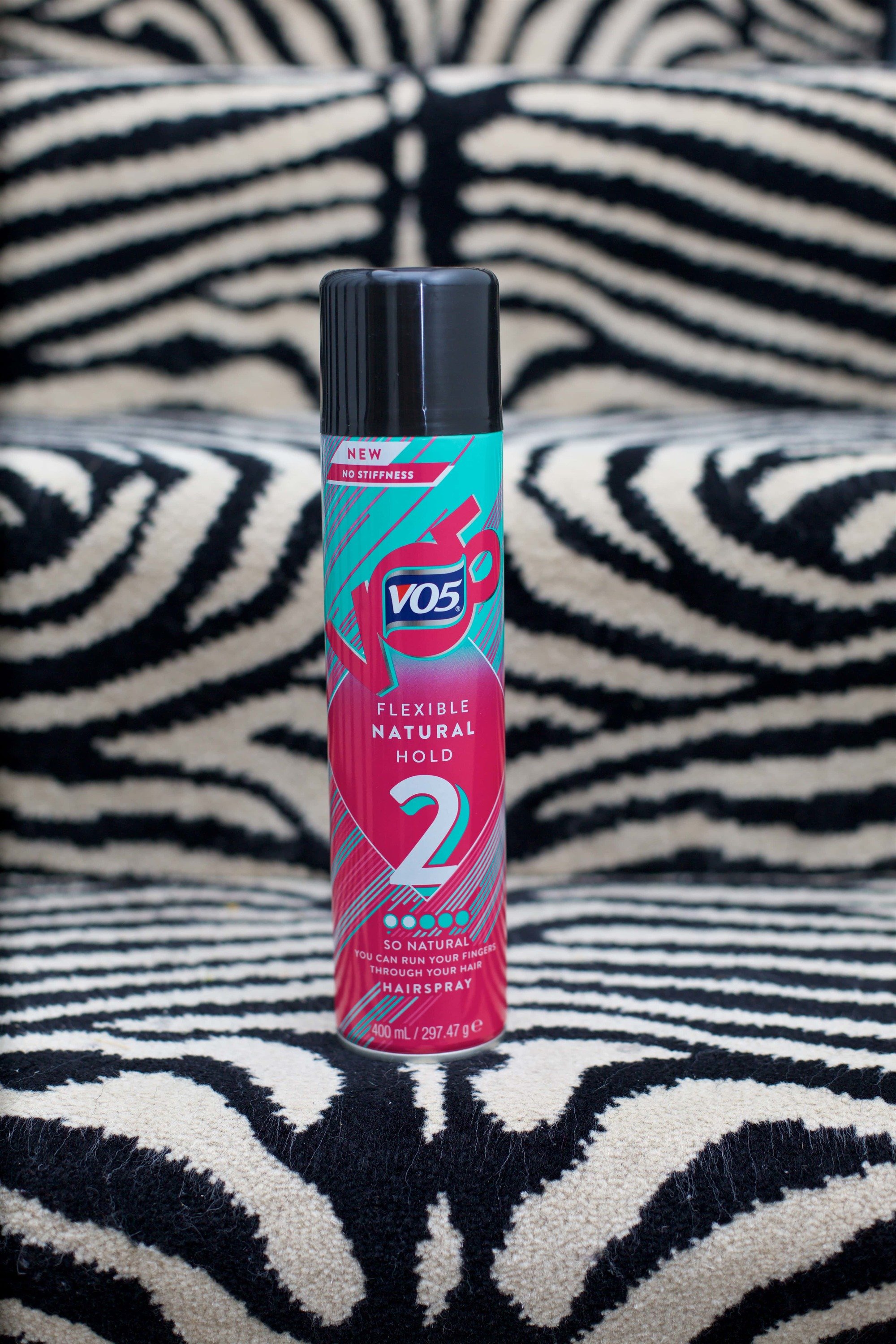 VO5 Flexible Hold Hairspray on zebra print steps.