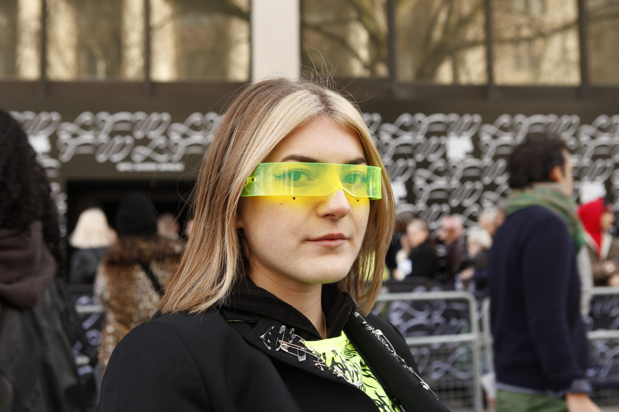 Woman with e-girl highlights wearing sunglasses