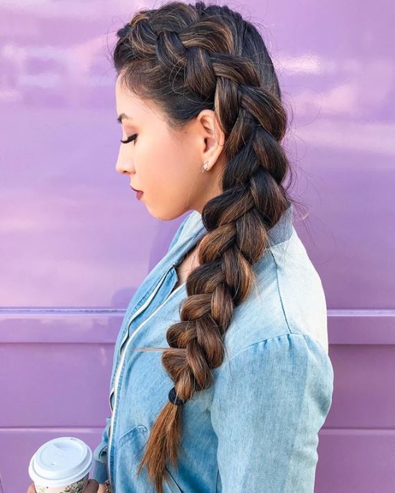 Brunette woman with long side dutch braid