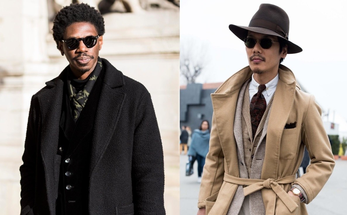 Beard styles: Street style shot of two men with different types of goatee beards, one wearing a hat, both wearing sunglasses outside