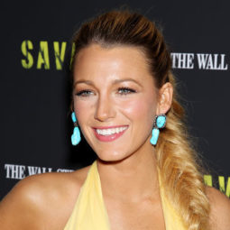 Blake Lively with long golden blonde hair in a fishtail ponytail braid.