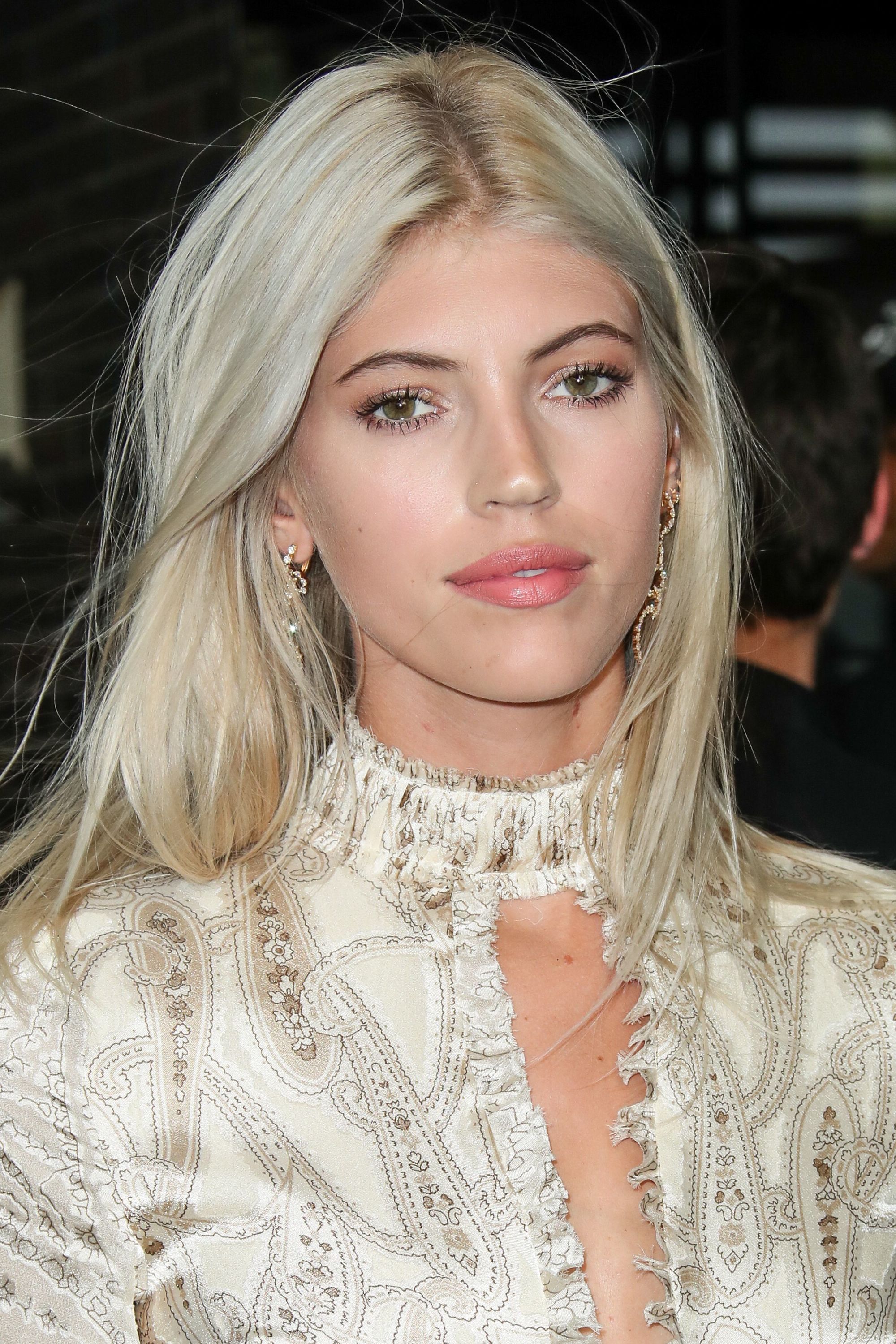 Devon Windsor with straight baby blonde hair