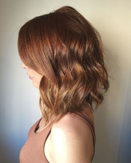 Woman with medium length auburn ombre