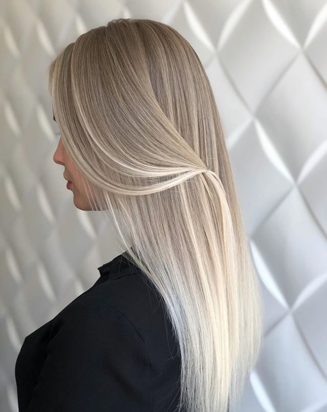 woman with long blonde ombre hair