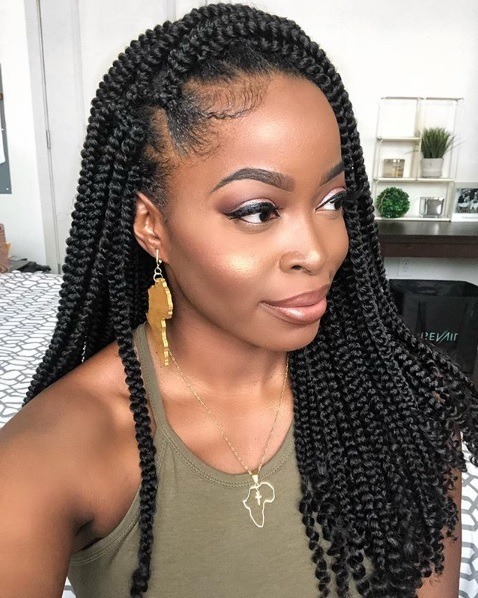 Woman with long brunette crochet box braids