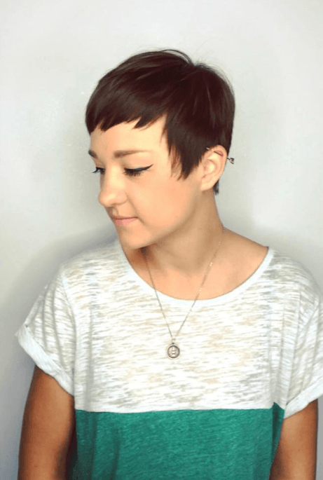 Woman with brown pixie cut