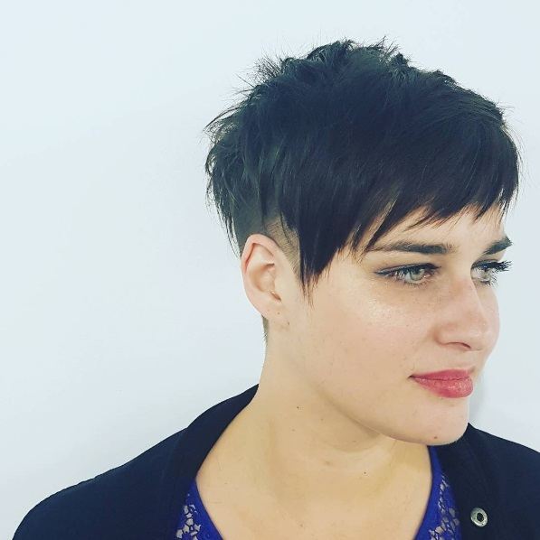 Woman with brown pixie undercut