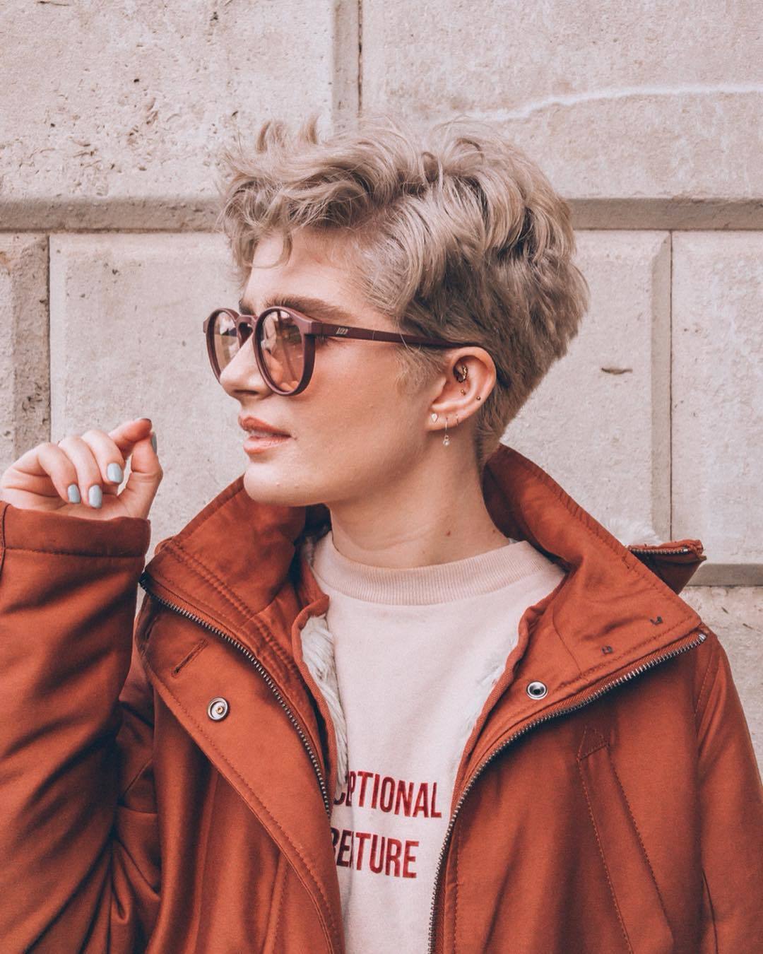 woman with ash blonde pixie haircut