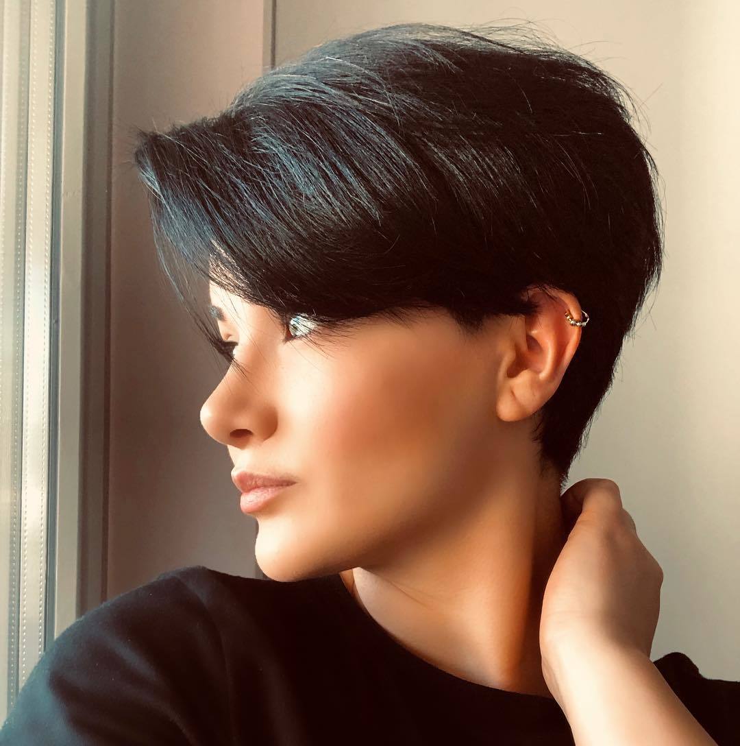 woman with brunette pixie cut