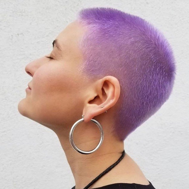 woman with a purple buzz cut pixie hairstyle