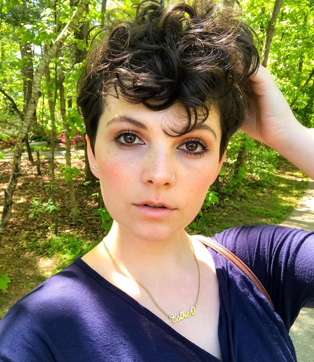 woman with curly pixie cut hairstyle