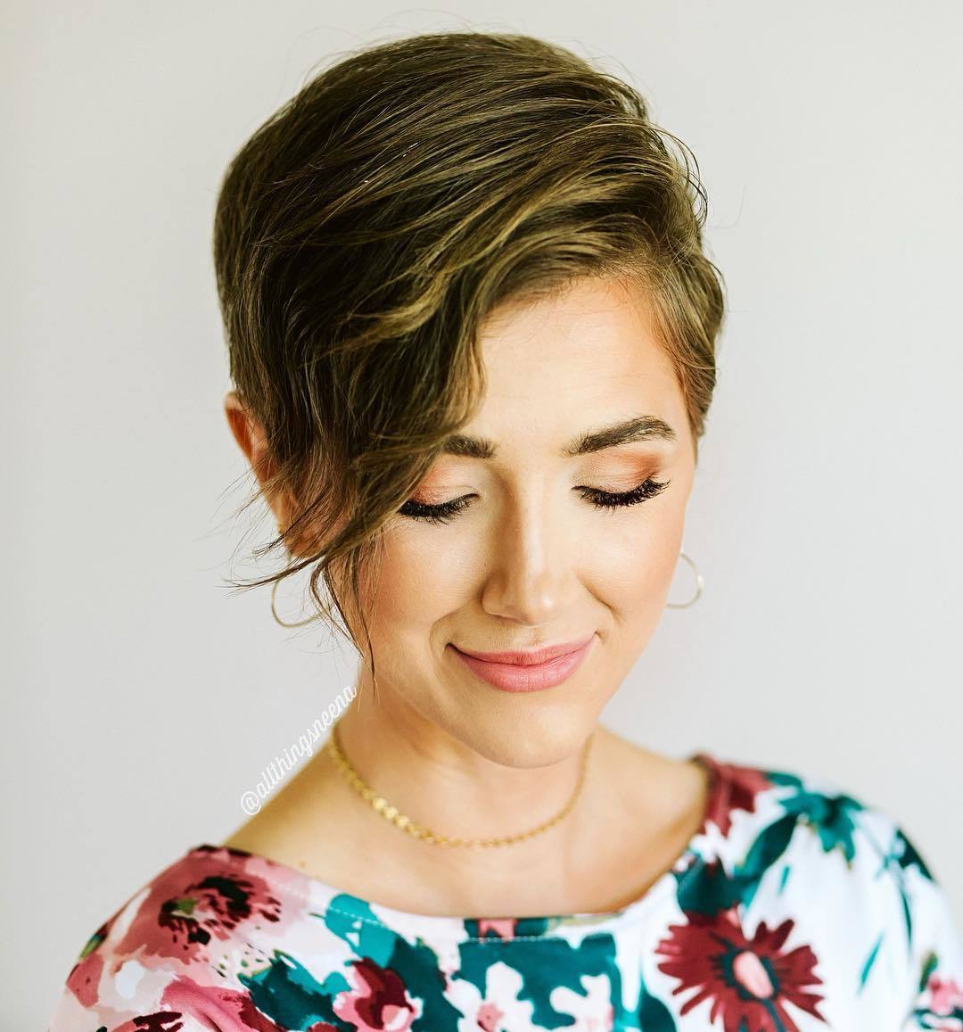 woman with light brown feminine pixie cut