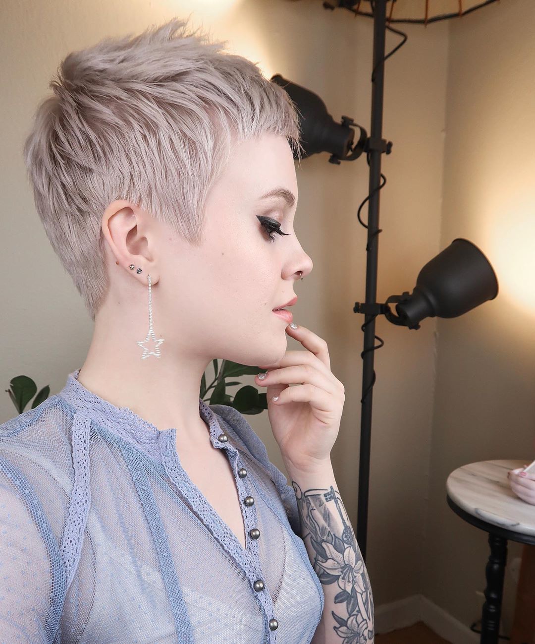 woman with ash blonde fine hair pixie cut