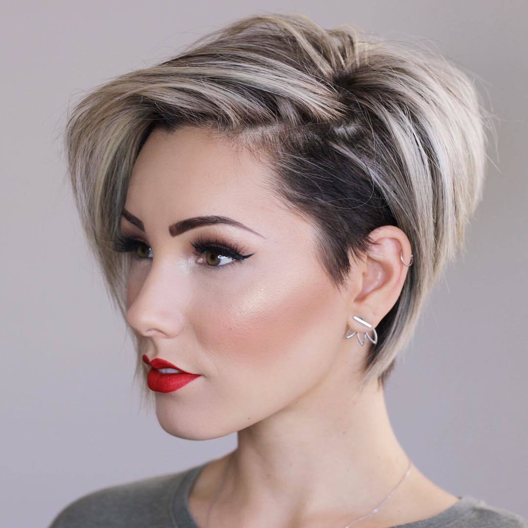 woman with an ash blonde pixie cut bob
