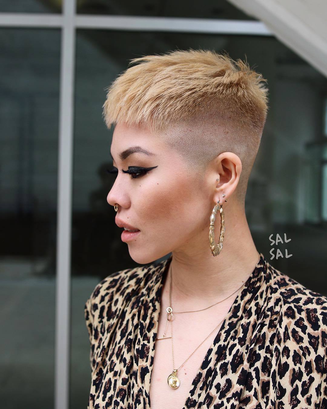 woman with short shaved blonde pixie cut
