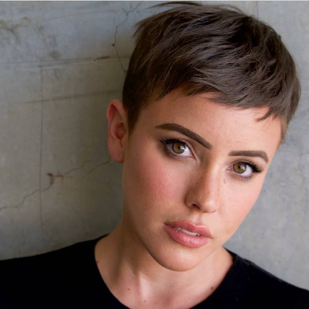 woman with short brown pixie cut