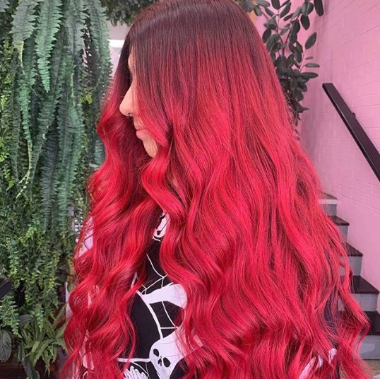 Woman with long red ombre hair