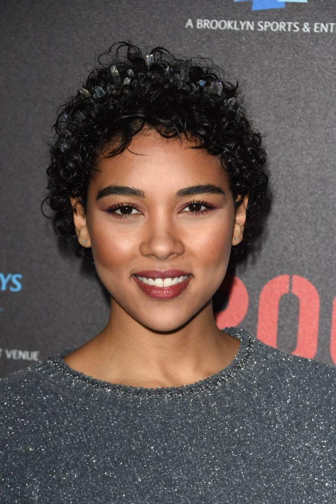 Woman with curly pixie cut