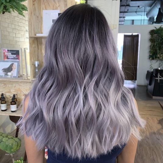 Woman with silver pearl ombre hair