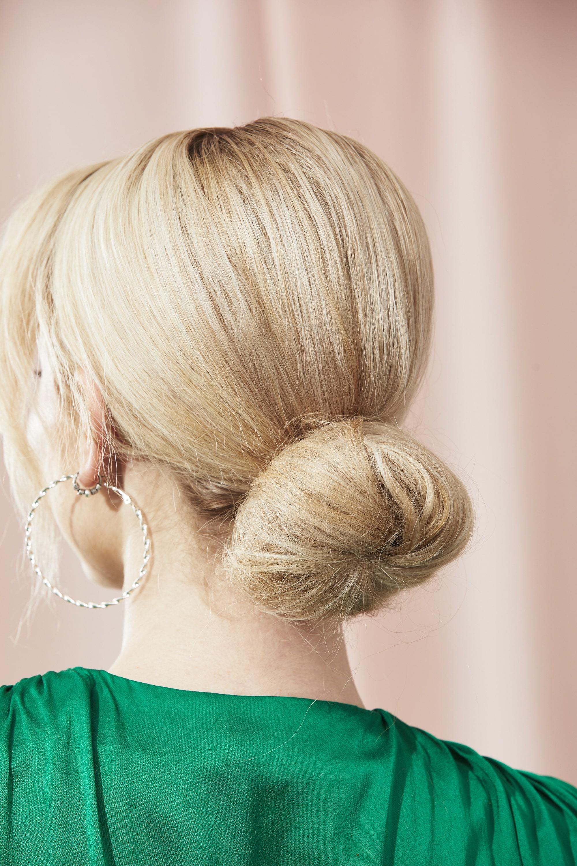 Woman with easy hair donut bun