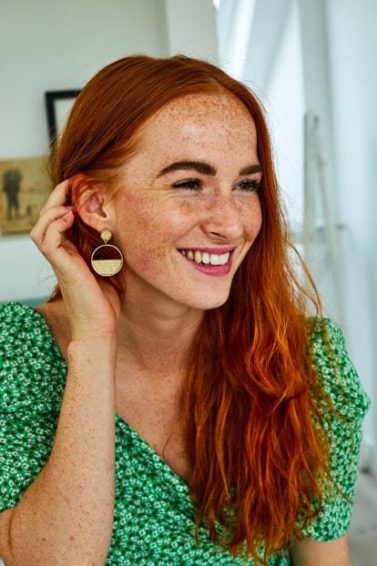 woman with ginger wavy hair and model with naturally curly hair