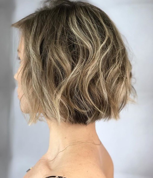 Woman with a bronde highlighted bob
